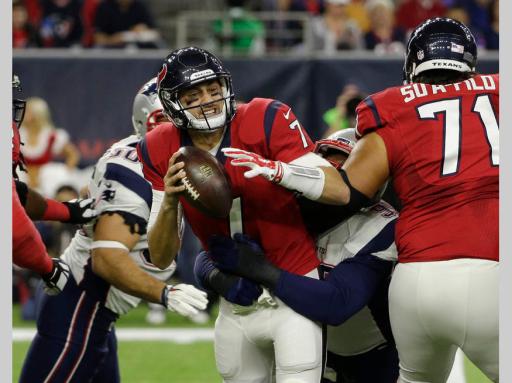 One of 6 sacks as Brian Hoyer is brought down by Dominique Easley with help from Ninkovich. (AP Photo/David J. Phillip)