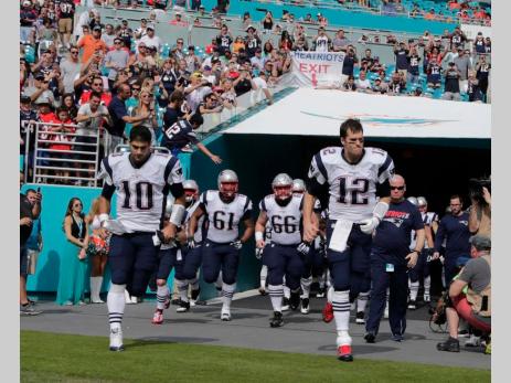 Entering the stadium you didn't see the usual fire in Tom Brady's eyes (Photo: AP Lynne Sladky)
